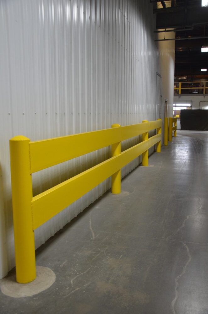 redone wall with pipe bollards